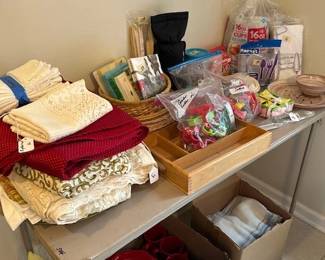 table linens, cookie cutters, dinnerware, drapes