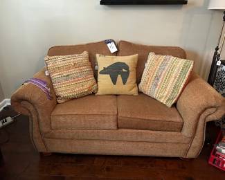 loveseat, pillows