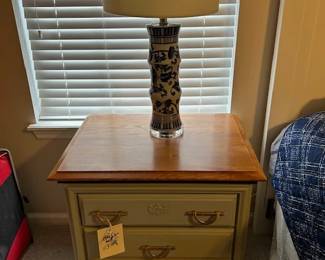 blue nightstand and blue and white lamp