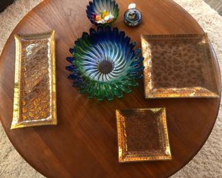 Three fine glass trays trimmed in shimmering gold scroll work.  All by Georges Briard.  