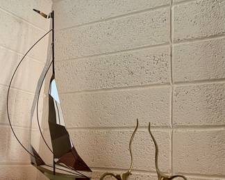 - Vintage Chrome Mario Jason sailboat on a stone base 
- Brass seagull bookends 