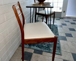 - (2) Niels Otto Moller chair #78, Walnut, refinished Pearl Leather seats 
- Iron Hairpin leg with Boomerang Laminate table circa 1950s 