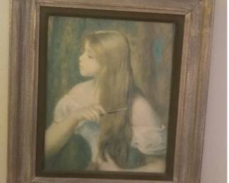 Young girl combing hair