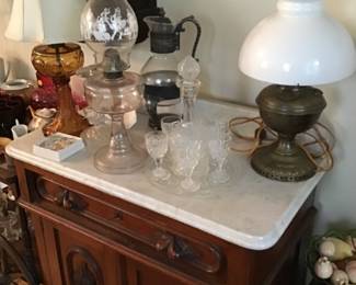 Several early oil lamp including