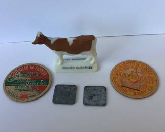 Dinsmore dairy tokens, caps and cow