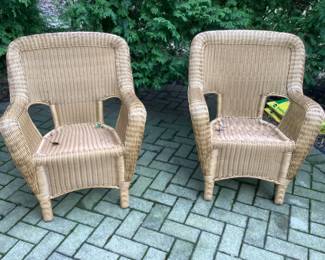 Two matching wicker chairs