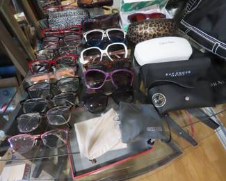 Selection of designer prescription and sun glasses.