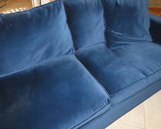 Blue velour sectional.