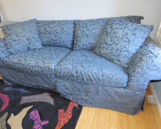 Very comfy blue fabric sofa.
