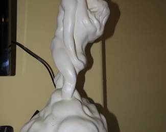 Porcelain statue.