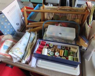 Sewing notions and needlepoint frames and patterns.