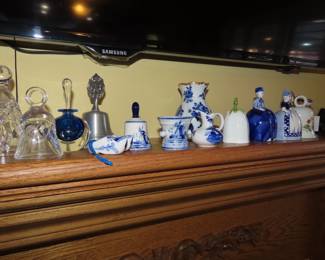 Crystal and porcelain bell collection.