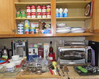 Food, Oster toaster oven, bareware, stainless flatware, cutting boards, bakeware, papergoods.