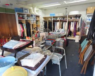 Table linens, medical equipment, folding chairs, luggage.