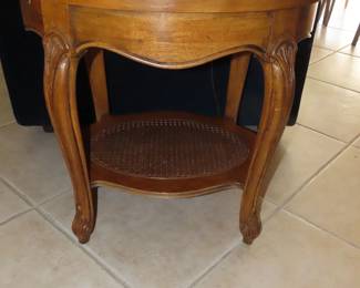 Oval wooden end table.