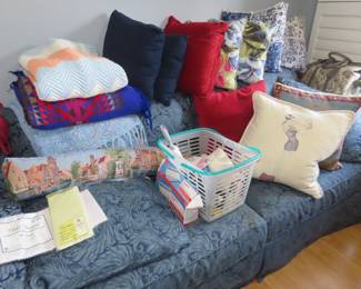 Second sofa with decorativ e throw cushions.