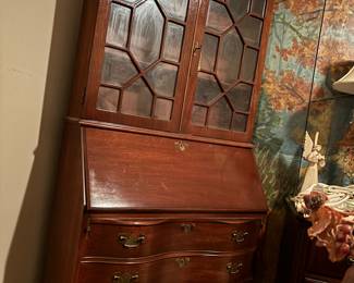 Vintage Secretary with bowed front and ball and claw feet