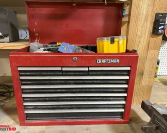  Craftsman flip top tool chest, 26.5" x 12" x approx. 20" tall, includes assorted sockets, wrenches, Allen wrenches, hammer, open end box wrenches, and more.