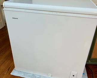 small Hotpoint freezer: 32” wide by 20” deep by 33” tall