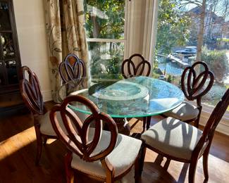 54” round glass top table with 6 chairs