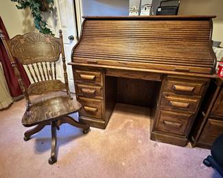 Oak roll-top desk, closed.