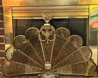 Victorian brass peacock fan fireplace screen.