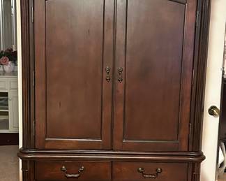 TV armoire with four drawers.