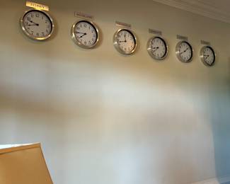 Six 12” stainless clocks