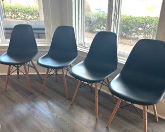 4 black molded side chairs