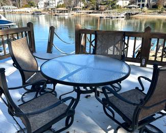 Outdoor table & 4 swivel chairs