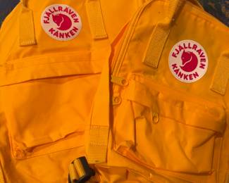 2 Fjallraven Kanken Yellow Backpacks