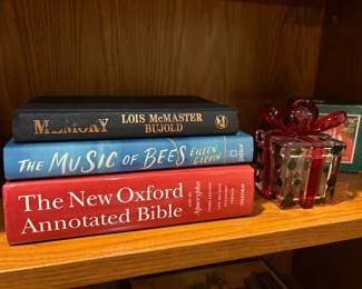 Memory Book by Lois McMaster Bujold, The Music of Bees Book by Eileen Garvin, The New Oxford Annotated Bible
