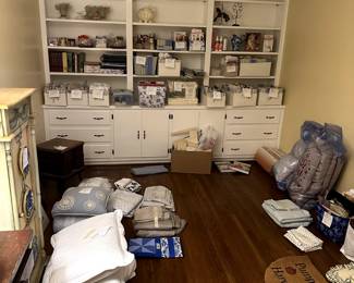 Sewing Room - lots of sewing and craft books, sewing patterns, linens, pillows, sewing machines