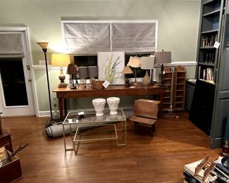 Lamps, Glass coffee table, antique school desk, candle sticks, records, books, barware