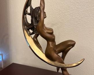 Woman in Moon Sculpture