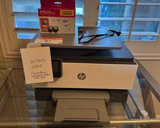 HP Office JetPro 8025E. Works great. Glass Desk.