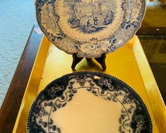 19th century flow blue plates--the top one is very rare and features an early Olympian scene