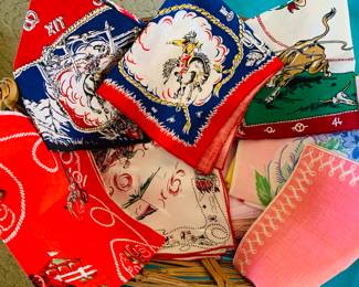 collection of vintage hankies and cowboy scarves