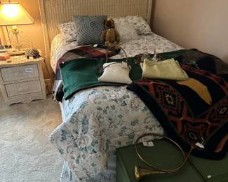 Decorative Brass French Horn, Storage Bins, Wicker Furniture, Brass Tray, Pillows,  Wool Blankets