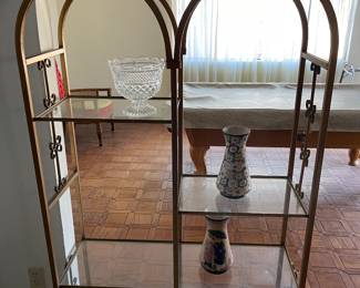 We have this smaller brass toned shelf