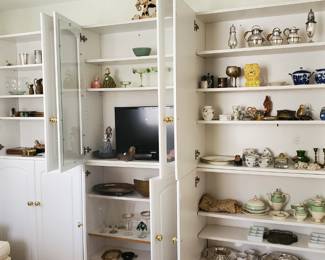 White laminate cabinet system, nice quality. Several pieces.
