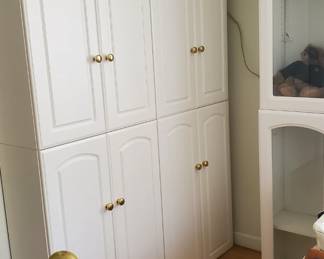 White laminate cabinet system, nice quality. Several pieces.
