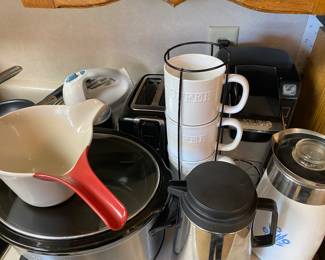 Crockpots, toaster, perculator, mixer