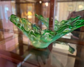 Beautiful piece of green art glass. 18-20 inches long. It’s not a small piece 