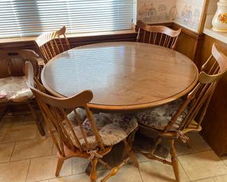 Nice little solid wood table they will last forever. Set of  windsor  chairs 