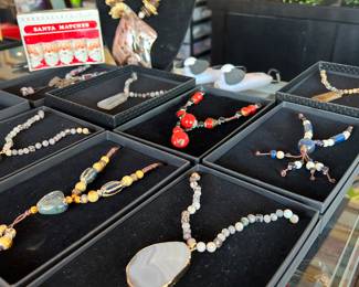 several necklaces & rings...