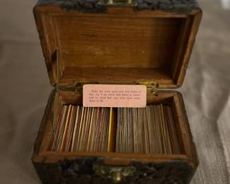 Vintage carved wood box filled with bible passages