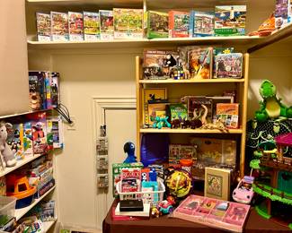 KID'S CLOSET FULL OF GAMES, PUZZLES, BOOKS, AND TOYS.