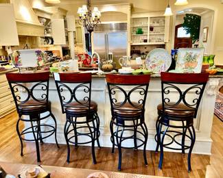 4 PRETTY SWIVEL BAR STOOLS.