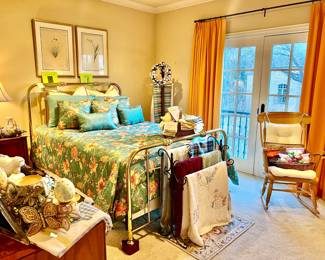 PRETTY SPRING BEDROOM WITH LOTS OF EASTER AND LINENS.